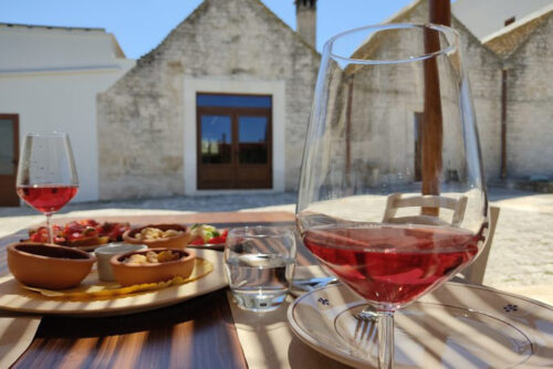 A meal with wine at family-owned Masseria Torricella