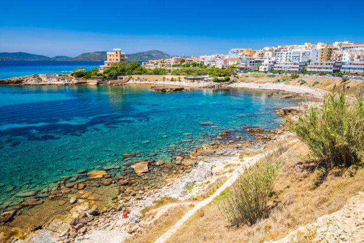 Alghero old city center with olive tree and colorful houses, Alghero, Sardinia-SStock
