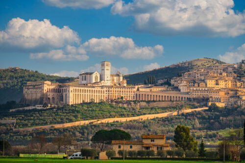 Assisi, Italy town skyline with the Basilica of Saint Francis of Assisi.