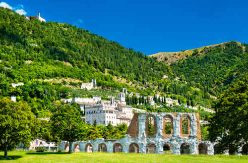 View of Gubbio with roman theatre and medieval towers in Umbria, Italy