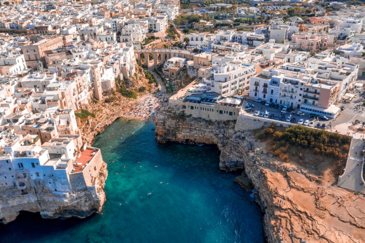 Aerial view of the beach lama monachile cala porto in the Italian city Polignano a Mare in the region of puglia