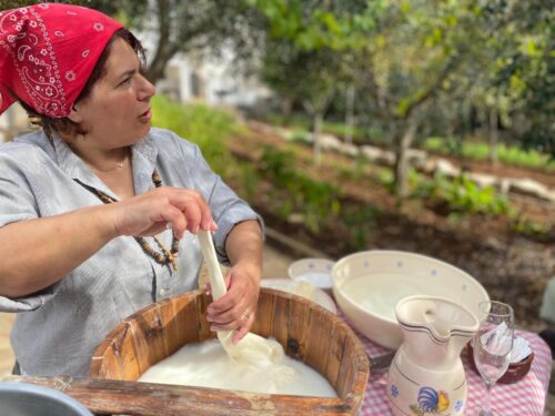 Nonna making mozzarella at a masseria farm in Puglia