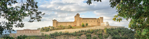 view of spoleto castle on top of the hill in Umbria. Ponte delle torri medieval bridge and Rocca Albornoziana hilltop fortress in Spoleto, Province of Perugia, Italy